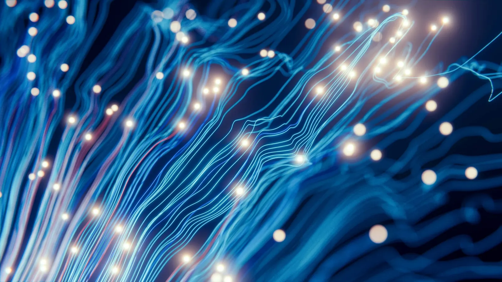 Abstract close-up of glowing blue fiber-optic strands, illustrating data flowing through AI systems.